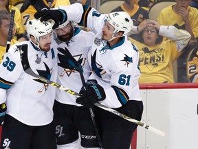 Sharks forward Logan Couture (39) celebrates his goal against the Penguins with teammates during the first period in Game 5 of the Stanley Cup final in Pittsburgh on Thursday, June 9, 2016. (Gene J. Puskar/AP Photo)