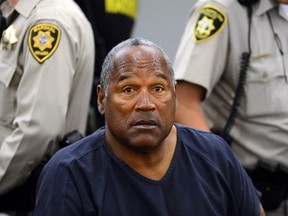 In this May 14, 2013, file photo, O.J. Simpson sits during a break on the second day of an evidentiary hearing in Clark County District Court in Las Vegas.  Prosecutors in O.J. Simpson's 1994 murder trial didn't know that he had been taking arthritis medication before trying on the famous ill-fitting bloody glove, former Los Angeles County District Attorney Gil Garcetti said Thursday, June 9, 2016. Garcetti, who led the prosecutor's office during the trial, told ABC's "Good Morning America" that he learned about the medication from watching the new ESPN documentary: "O.J.: Made in America." (AP Photo/Ethan Miller, Pool, File)
