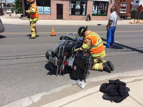 Emergency workers at the scene of a crash at Horton and Clarence streets on Friday. (Hala Ghonaim)