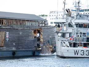 The damage of the hull of a wooden exhibition ship built as a representation of Noah's Ark after it crashed into a moored Coast Guard vessel in Oslo harbour, Friday, June 10, 2016. (Hkon Mosvold Larsen, NTB Scanpix)