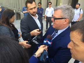 Zane Caplansky speaks to reporters outside court on Friday, June 10, 2016 (Nick Westoll/Toronto Sun)