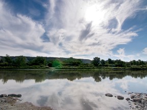 Morning clouds starting to build up over the Red Deer River at Tolman Bridge east of Trochu on Tuesday June 7, 2016. Mike Drew/Postmedia