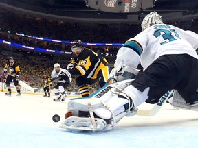San Jose Sharks goalie Martin Jones (31) makes a save with his left pad on a shot by Pittsburgh Penguins forward Nick Bonino during Game 5 of the Stanley Cup final Thursday, June 9, 2016, in Pittsburgh. (Bruce Bennett/Pool Photo via AP)
