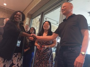 Junietta Macauley meets with the Winnipeg scientists who developed the Ebola drug ZMab that helped save her life. (DAVID LARKINS/WINNIPEG SUN)