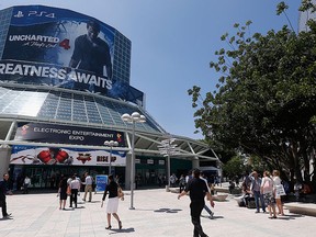 Game enthusiasts and industry personnel arrive to the Annual Gaming Industry Conference E3 at the Los Angeles Convention Center on June 16, 2015 in Los Angeles, Calif.  (Photo by Christian Petersen/Getty Images)