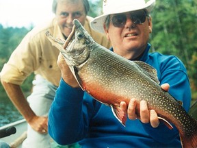 A client holds up a six-pound brook trout that guide and Sudbury Star columnist Frank Clark put him on using an outside-of-the-box technique his father showed him years ago. Frank Clark/For The Sudbury Star