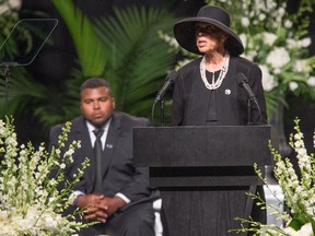 Lonnie Ali, the widow of Muhammad Ali delivers a eulogy speech during the memorial service for boxing legend Muhammad Ali at the KFC Yum Center on June 10, 2016 in Louisville, Kentucky. (AFP PHOTO/Michael B. Thomas)