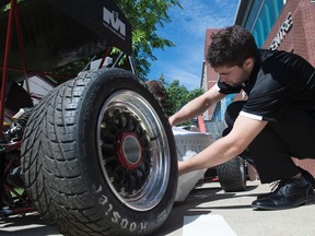 Students from The faculty of Mechanical Engineering at the University of Alberta unveiled their Formula SAE race car before taking it to Nebraska for a competition. The car cost about $20 000 to build, but they are offset by sponsors. Shaughn Butts / POSTMEDIA NEWS NETWORK