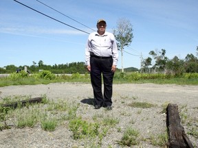 Ben Leeson/The Sudbury Star
Arthur Choquette stands in the empty lot at the corner of Highway 69 and South Lane Road that used to be occupied by his blueberry stand. The longtime Sudbury vendor arrived Friday morning to prepare for the upcoming season, but found his stand, which had been fastened to railroad ties using 10-inch spikes, had been taken.