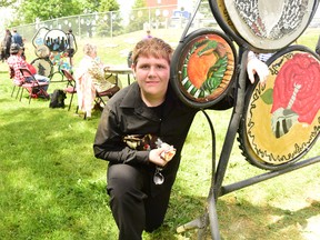 Mary Katherine Keown/The Sudbury Star
Nolan Nadeau, a Grade 10 student at Sudbury Secondary School, poses with his artistic creation along the green stairs art walk, near Marymount Academy in this file photo.