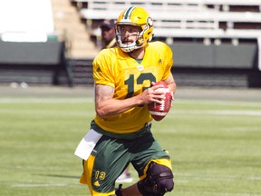 Edmonton Eskimos quarterback Mike Reilly looks upfield for passing options during a training camp drill at Commonwealth Stadium in Edmonton Alta. on Tuesday May 31, 2016.