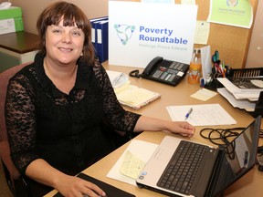 Tim Miller/The Intelligencer
New Prince Edward Poverty Roundtable (PRT) director, Christine Durant, sits at her desk at the organization's offices on Station Street on Friday in Belleville.