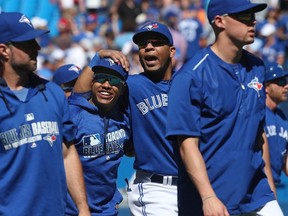 Edwin Encarnacion of the Toronto Blue Jays celebrates their victory with Marcus Stroman during MLB game action against the Baltimore Orioles on June 11, 2016 at Rogers Centre. (Tom Szczerbowski/Getty Images/AFP)