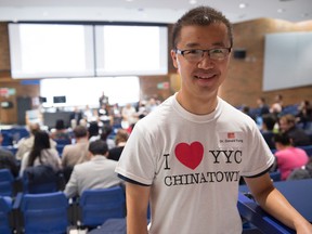 Dr. Donald Yung wears a T-shirt declaring his love of Calgary's Chinatown at a Saturday conference in Edmonton looking at the future of Chinatowns in big cities.