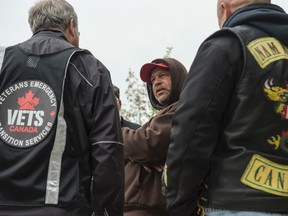 Carl Robichaud speaks with volunteers who came out on Saturday, June 11, 2016, to visit Edmonton homeless shelters in search of homeless war veterans.