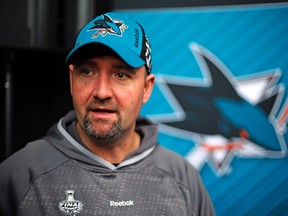 San Jose Sharks head coach Peter DeBoer talks with a reporter during Stanley Cup Finals media day in Pittsburgh, Sunday May 29, 2016. Sometimes San Jose Sharks veterans Joe Thornton and Patrick Marleau need to be coaxed off the ice. That task fell this season to Sharks head coach Pete DeBoer, who has drawn rave reviews among his players for his ability to use rest as an advantage. (THE CANADIAN PRESS/AP, Gene J. Puskar)