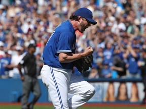 Jason Grilli of the Toronto Blue Jays celebrates after recording the final out of his team's victory over the Baltimore Orioles on June 11, 2016 at Rogers Centre in Toronto. (TOM SZCZERBOWSKI/Getty Images/AFP)