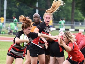 Bulldogs (red jerseys) vs. Oshawa, in senior women's rugby action Saturday at MAS Park. (Submitted photo)