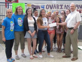 Students from Catholic Central high school present a cheque to Jim Olson, chair of the London Run for Ovarian Cancer, for the school?s fundraising efforts. (Submitted photo)