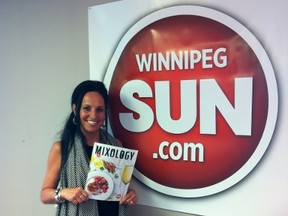 Winnipeg Sun publisher Daria Zmiyiwsky holds a copy of Mixology magazine, a new Winnipeg Sun publication being included in the Monday, June 13, 2016 Winnipeg Sun. It will also be available at all Manitoba Liquor Marts. (GLEN DAWKINS/Winnipeg Sun/Postmedia Network)