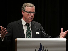Brad Wall, Premier of Saskatchewan, talks to  energy industry executives at a luncheon hosted by The Explorers and Producers Association of Canada (EPAC) at Calgary's Petroleum Club on June 8, 2016.  Gavin Young/Postmedia