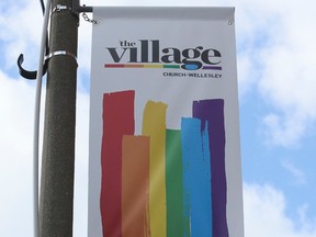 A sign in the heart of Toronto's gay community in the Church-Wellesley Sts. area. (VERONICA HENRI, Toronto Sun)