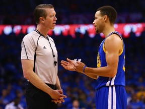 Stephen Curry of the Golden State Warriors talks with a referee during the first half against the Oklahoma City Thunder in game six of the Western Conference Finals during the 2016 NBA Playoffs at Chesapeake Energy Arena on May 28, 2016 in Oklahoma City.  (Maddie Meyer/Getty Images/AFP)