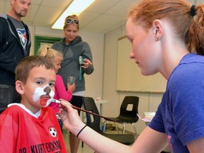Hazy Lord had his face painted by Maddie Larivee June 9 at the Upper Thames Elementary School (UTES) Fun Fair. GALEN SIMMONS MITCHELL ADVOCATE