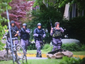 Toronto Police ETF officers on the University of Toronto's downtown campus on June 13, 2016. (Dave Abel/Toronto Sun)