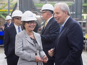 Public Services Minister Judy Foote, left, shares a light moment with Jim Irving, CEO of Irving Shipbuilding, at the Irving Shipbuilding facility in Halifax on Monday, June 13, 2016. THE CANADIAN PRESS/Andrew Vaughan