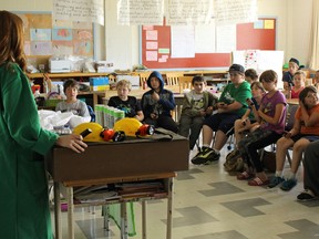 Recycle Your Electronics representative Sarah O'Shaughnessy speaks to a Grade 5 class about the consequences of electronic waste at Rideau Heights Public School. (Julia Balakrishnan/For The Whig-Standard)
