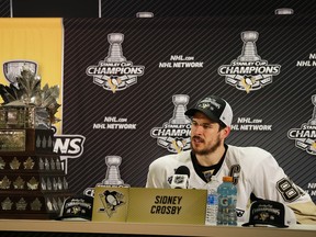 Pittsburgh Penguins centre Sidney Crosby speaks next to the Conn Smythe Trophy during a news conference after Game 6 of the Stanley Cup final in San Jose on June 12, 2016. (AP Photo/Eric Risberg)