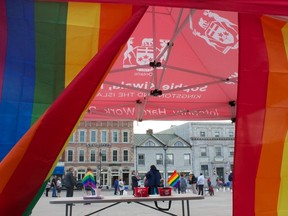 Residents and supporters begin arriving at Springer Market Square on Monday night for vigil in honour of the victims killed in mass shootings at Pulse Nightclub in Orlando, Fla. on Sunday morning. (Victoria Gibson/For The Whig-Standard)