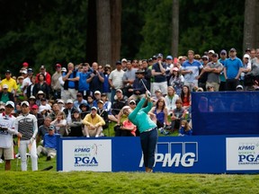 Brooke Henderson of Canada hits a tee shot on the 17th tee during the final round of the KPMG Women's PGA Championship at Sahalee Country Club in Sammamish, Wash., on June 12, 2016. (Otto Greule Jr/Getty Images/AFP)