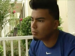 In this image made from AP video, Luis Burbano speaks during an interview with The Associated Press in Orlando, Fla., Monday, June 13, 2016. Burbano felt his bones shake when the bullets started flying early Sunday morning in the Orlando gay nightclub where a gunman opened fire and killed dozens of people. (AP Photo/AP Video)