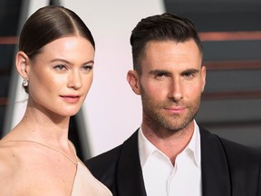 Behati Prinsloo and Adam Levine attend 2015 Vanity Fair Oscar Party on February 22, 2016. (Brian To/WENN.com)