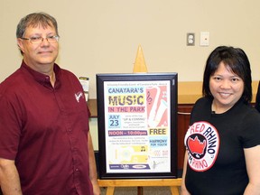 From left, musician Cynthia Fay, Harmony for Youth executive director Gerry Surette, and My Red Rhino TV owners Melanie and Richard Marhue showcase the poster for Canatara's Music in the Park on Tuesday June 14, 2016 in Point Edward, Ont. The 10-hour free-admission concert on July 23 will feature seven up-and-coming acts. (Terry Bridge, Sarnia Observer)