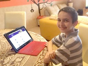 Kelton Kostis, 12, is on track to earn a computer science degree from Nebraska's Bellevue University by age 13. He is pictured here at his family's vacation on home in Mexico on Thursday June 9, 2016. (Ellwood Shreve/Chatham Daily News/Postmedia Network)