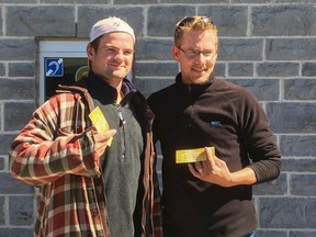 Scottie Ste Marie, left, and Kevin Yateman were among the first in line when a block of The Tragically Hip tickets went on sale at 10 a.m. at the Rogers K-Rock Centre in Kingston, Ont. on Tuesday June 14, 2016. Both men had been waiting in line since the previous night. (Jacob Rosen/For The Whig-Standard)