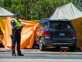 Toronto Police at the scene on Bremner Blvd. after a Mercedes SUV jumped the curb and crashed into vendors steps from Rogers Centre June 14, 2016. (Ernest Doroszuk/Toronto Sun)