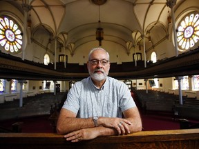 Luke Hendry/The Intelligencer
Rev. David Mundy stands in the sanctuary of Bridge Street United Church in Belleville Tuesday. The church will hold a memorial Friday for victims of the Orlando massacre. Mundy said it's not a church service: it's a half-hour gathering for all people to reflect.