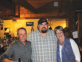 Original owners Heinz (left) and Sylvia (right) Inabnit with current manager Curtis Carnduff (centre) during the final concert night at The Swiss on Friday. | Carlos Verde photo/Pincher Creek Echo