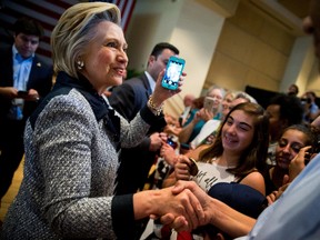 Democratic presidential candidate Hillary Clinton greets members of the audience after speaking at a rally at the International Brotherhood of Electrical Workers Circuit Center in Pittsburgh, Tuesday, June 14, 2016. (AP Photo/Andrew Harnik)