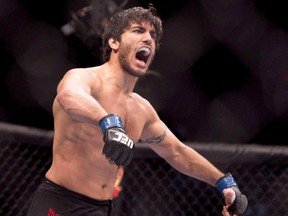 Elias (The Spartan) Theodorou celebrates his win over Sheldon Wescott at UFC Fight Night in Quebec City Wednesday, April 16, 2014. (THE CANADIAN PRESS/Jacques Boissinot)