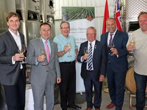 BRUCE BELL/THE INTELLIGENCER
Wellington’s Noman Hardie Winery received $43,000 from the federal and provincial Growing Forward 2 program on Wednesday afternoon. Pictured at the announcement at the winery are (from left) Ontario Wine council president Richard Linley, Bay of Quinte MP Neil Ellis, Ontario Minister of Agriculture, Food and Rural Affairs Jeff Leal, Prince Edward County Mayor Robert Quaiff, Prince Edward – Hastings MPP Todd Smith and Norman Hardie.