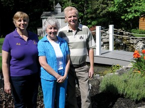 Tillsonburg Lioness Judy Witczak, and garden hosts Bobbi and Frank Moore. (CHRIS ABBOTT/TILLSONBURG NEWS)