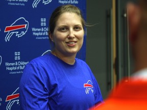 Six months into her job as a Buffalo Bills assistant coach, and Kathryn Smith already is spinning out bromides like the long snapper she helps mentor.