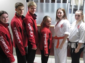 Four martial artists from Martial Arts Canada qualified for the WKC World Championships in Ireland this fall, and two more as alternates. From left are Isabella Conti, Josh Gedye, Kristian VanLeeuwen, Jaylee Nolan, Tanya Hamm, Ashley Rosehart and sensei Sara Ens. (CHRIS ABBOTT/TILLSONBURG NEWS)
