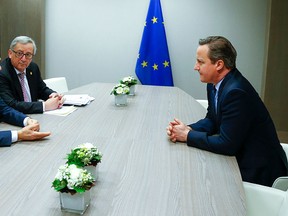 British Prime Minister David Cameron (R) attends a meeting with and European Council President Donald Tusk (L) and European Commission President Jean Claude Juncker (C) during a European Union leaders summit addressing the so-called Brexit on February 19, 2016. YVES HERMAN/AFP/Getty Images