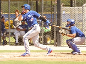 Jays shortstop Troy Tulowitzki hits a double while rehabbing in Dunedin on Wednesday. (EDDIE MICHELS PHOTO)